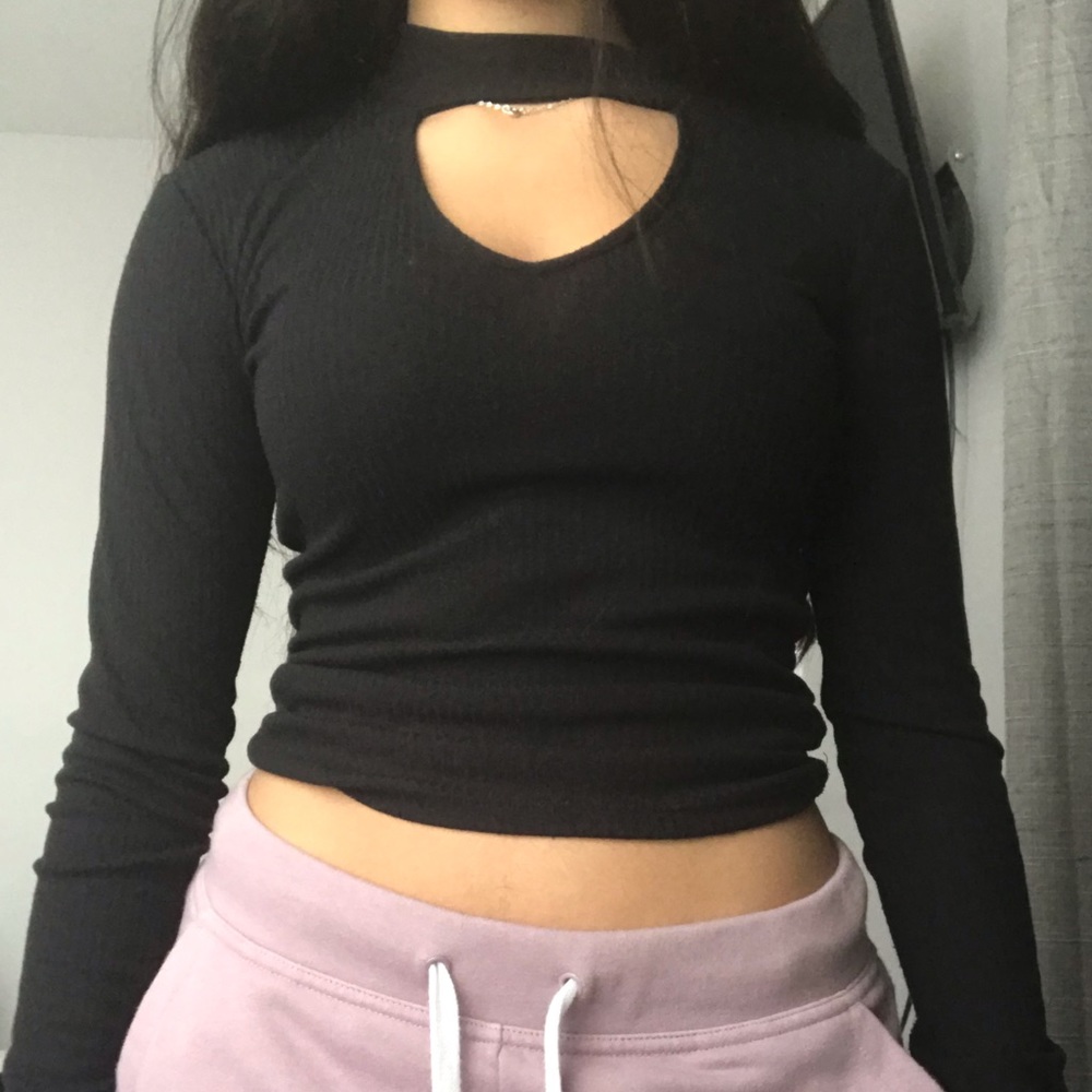 Cute top worn once with cut hole